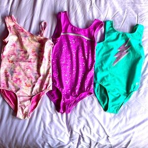 3-Girls gymnastics leotard, size medium.